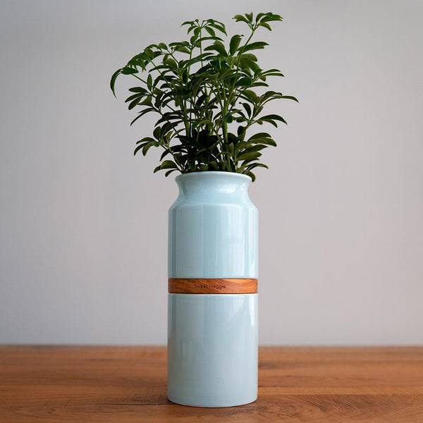 The Vega Vase in Blue with Dark Wood