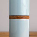 The Vega Vase in Blue with Dark Wood